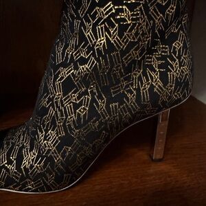 Authentic Chanel Black and Gold Women's heels